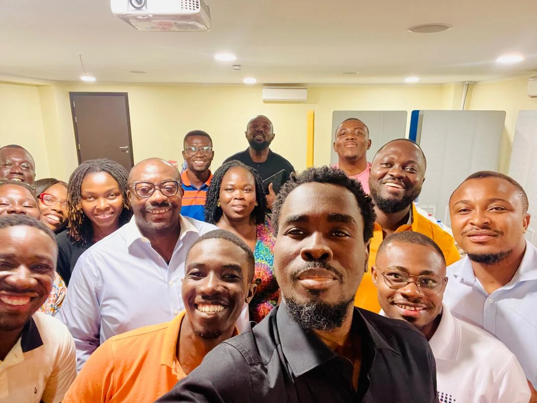 Group selfie with Obinna Chuku and participants at an IC Securities session